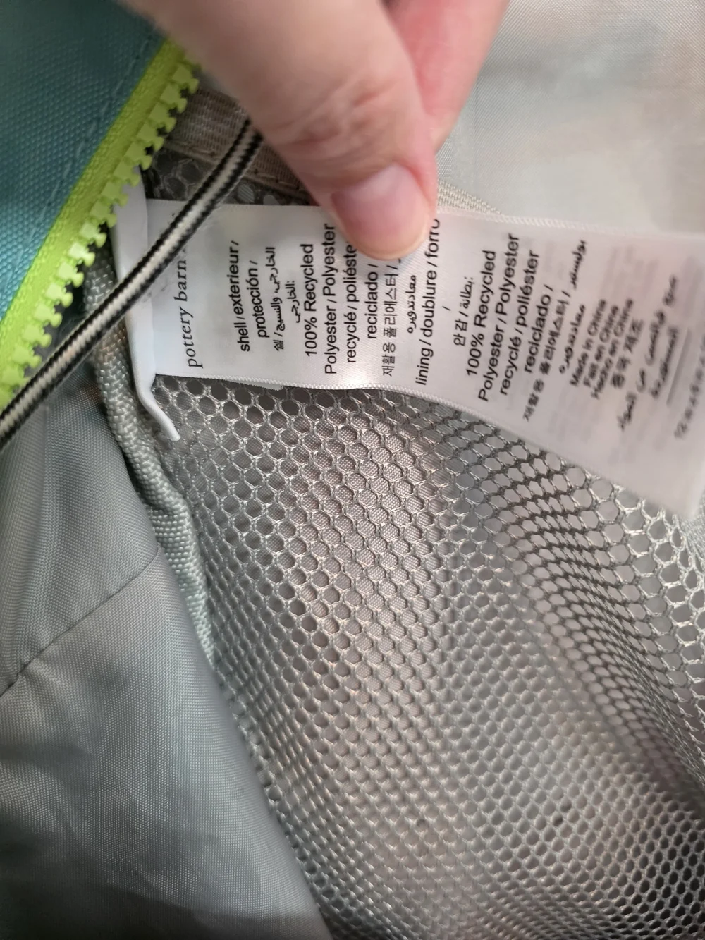 Pottery Barn Kids Astor Backpack featuring pink, aqua, and lime green colors.